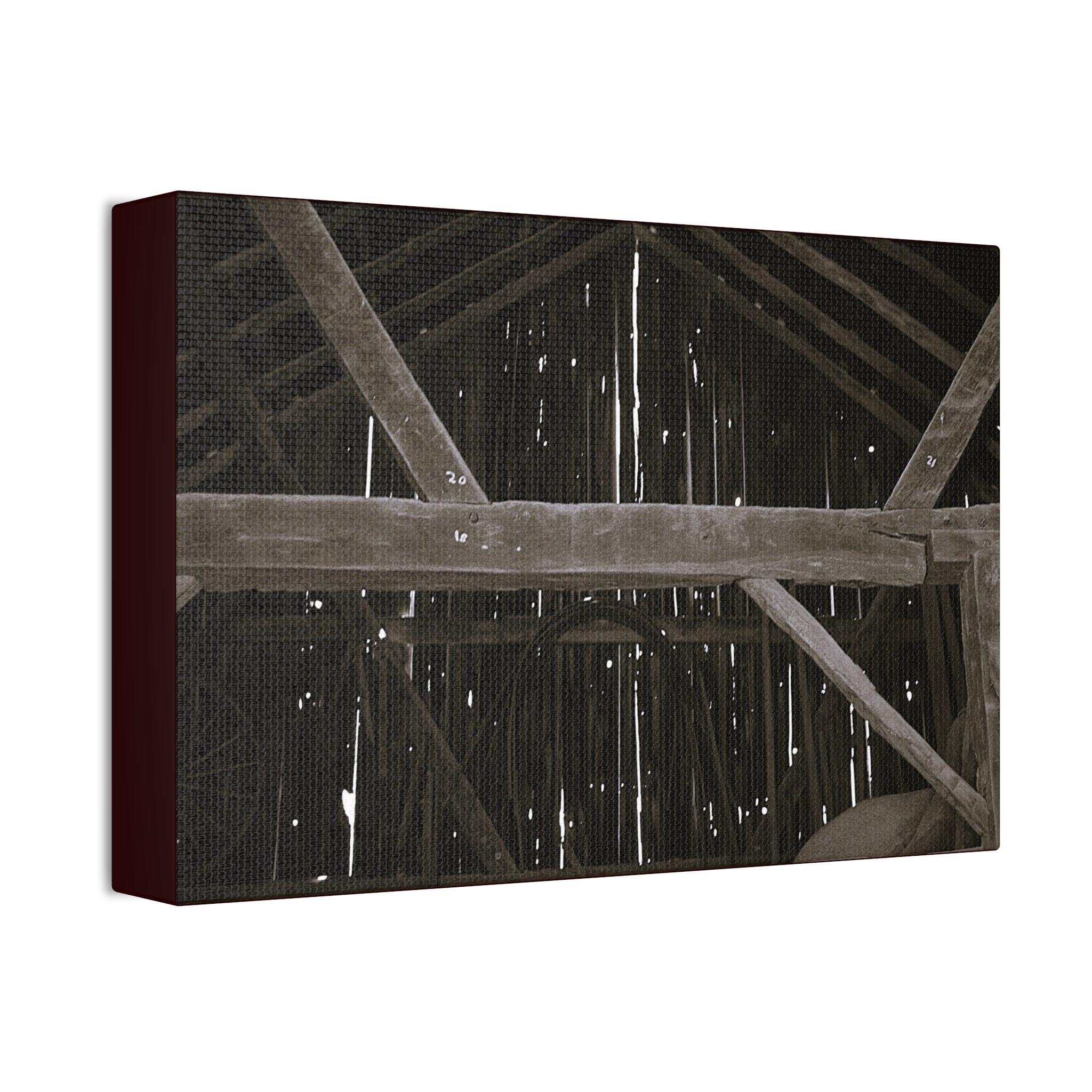 Rustic barn interior framed canvas print — moody looking-up view of weathered wooden beams and rafters with pinpoints of light, farmhouse photography wall art